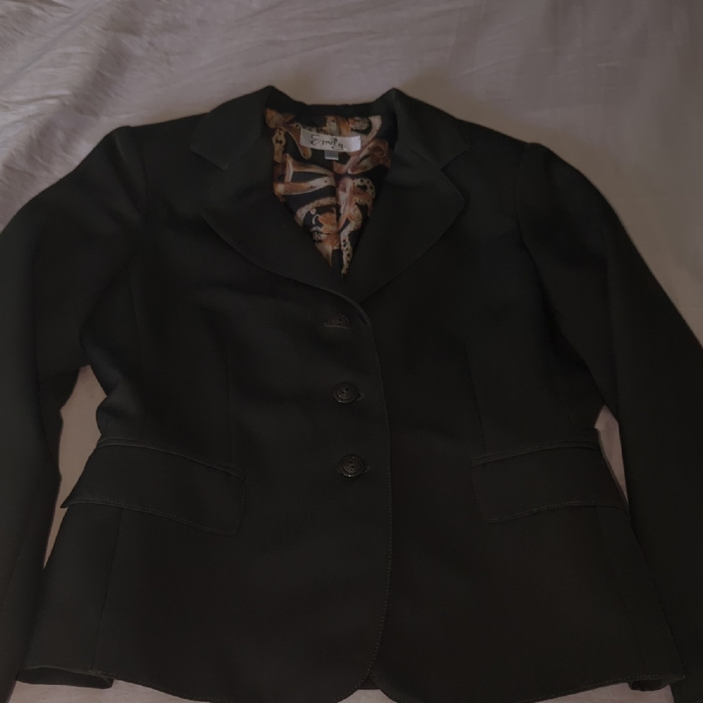 Elegant Black Blazer by [Brand]